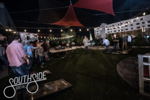 Crush your friends in cornhole at chattanoogas favorite bar